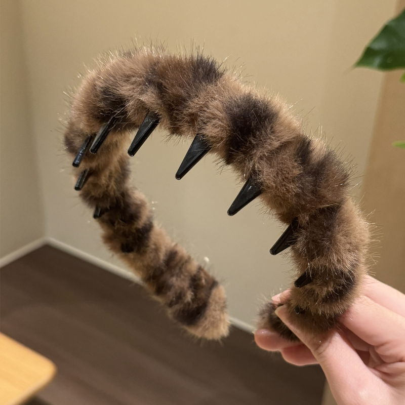 Serre-tête à imprimé léopard avec dents