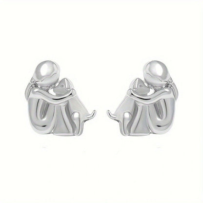 Petite Fille Câlinant un Chien – Clous d’Oreilles et Collier