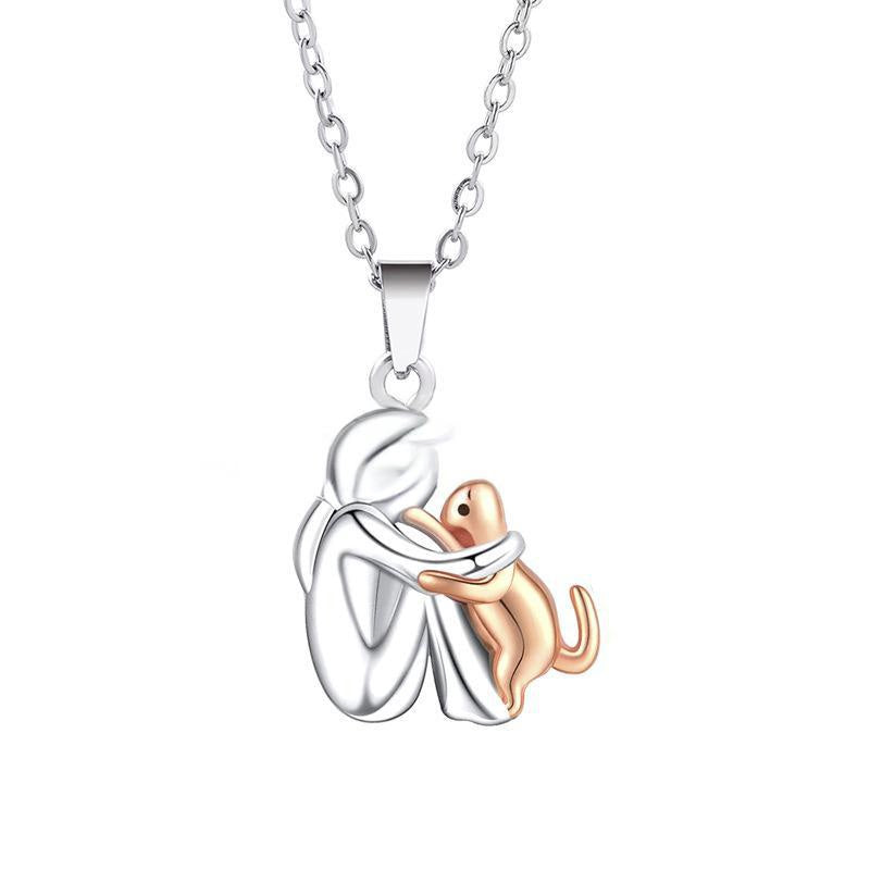 Petite Fille Câlinant un Chien – Clous d’Oreilles et Collier