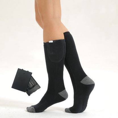 🎊 50% off 🎊 Chaussettes chauffantes à température réglable - batterie améliorée - unisexe