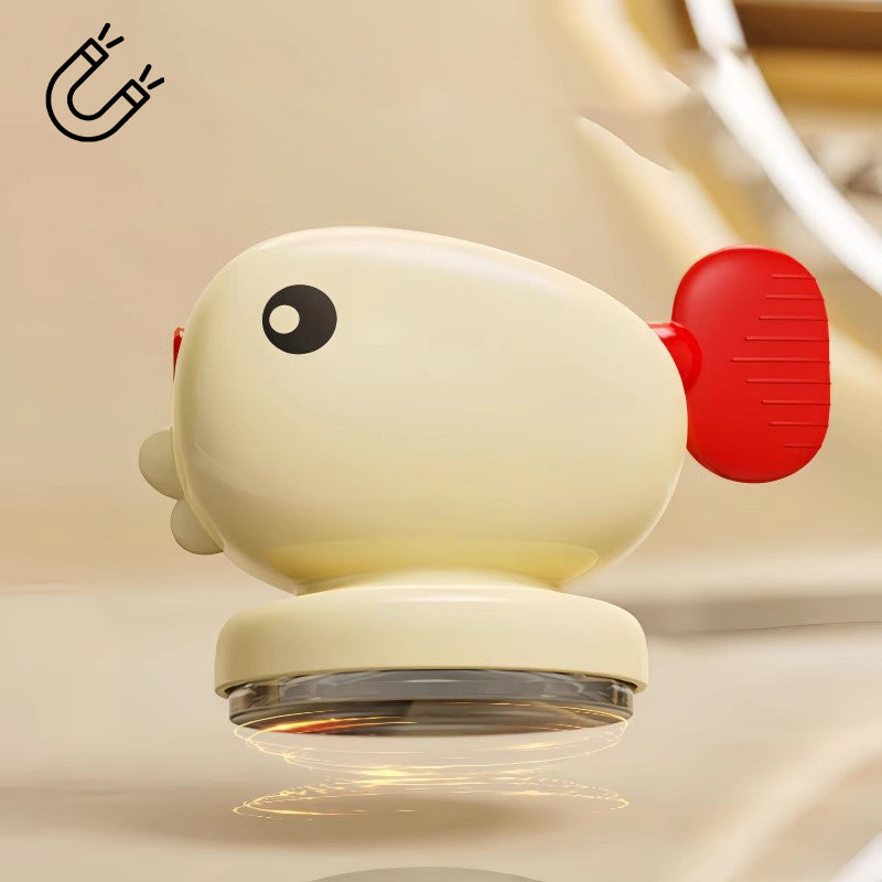 Adorable poisson rouge avec ventouse pour presser le dentifrice