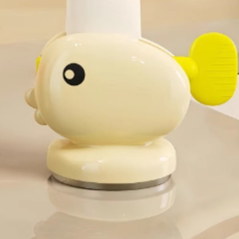 Adorable poisson rouge avec ventouse pour presser le dentifrice